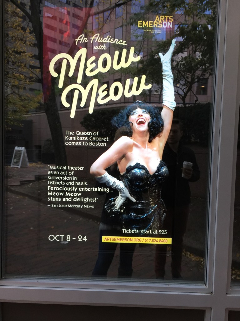 Sounds like our kind of show. Meow! Note Nick's reflection in the glass. Hah!